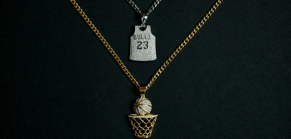 two basketball-themed pendants